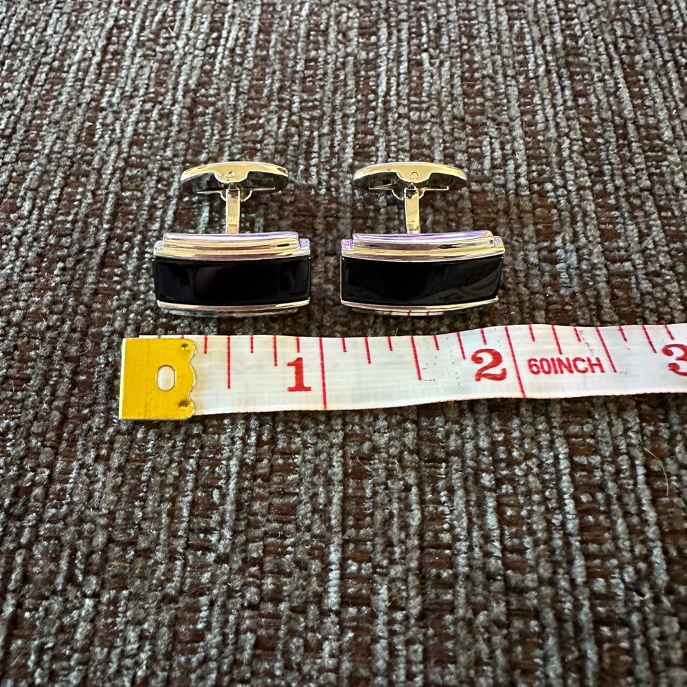 Unbranded black detail on silver tone metal men’s cufflinks